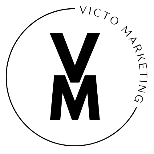 Black VM letters in the center of a circle with the words "VICTO MARKETING" around the upper right side of the circle in black.